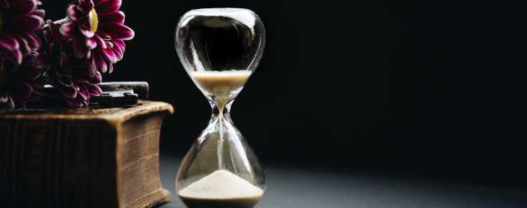 sand hourglass with flowers